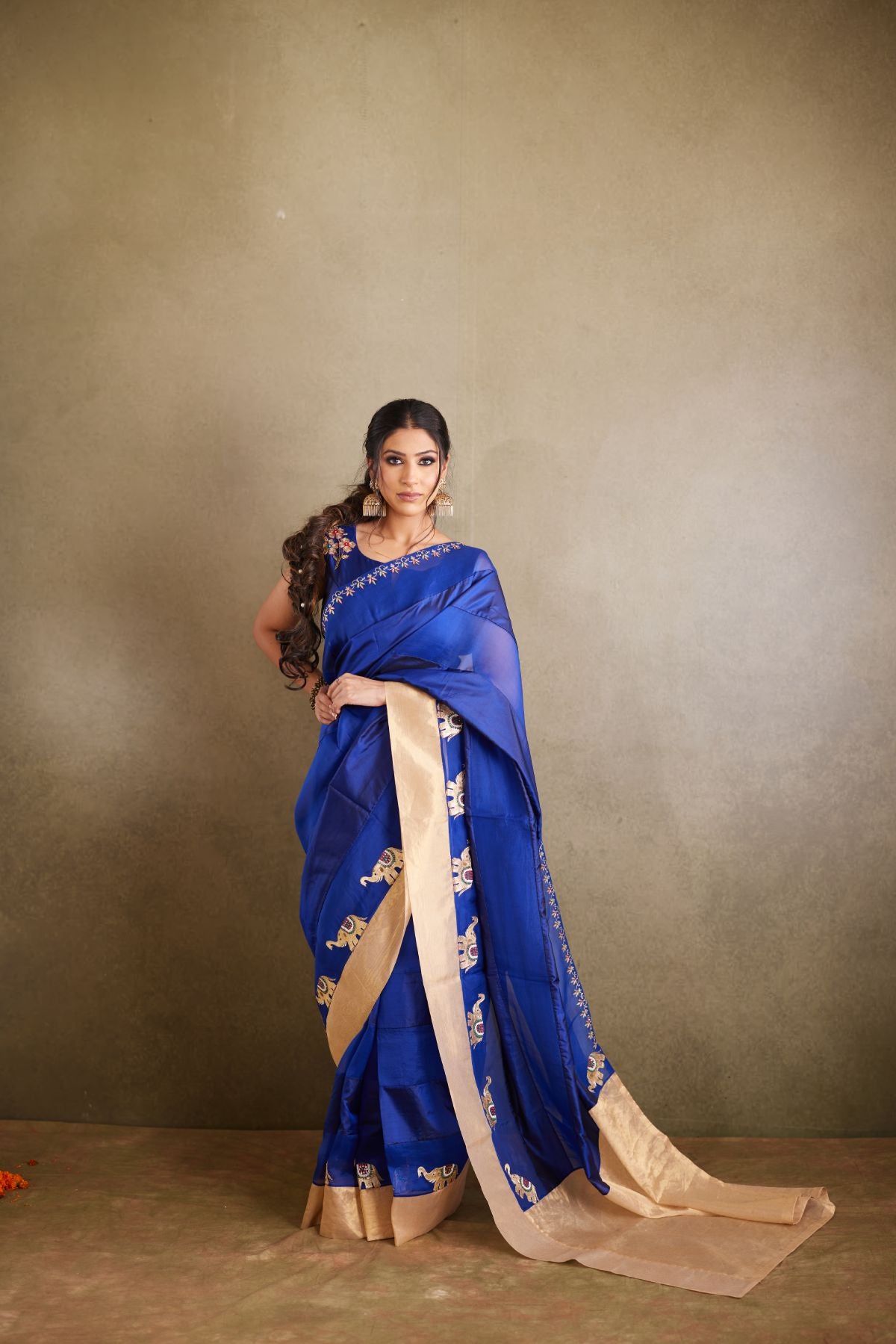 The Royal Azure - Blue Organza & Silk Saree with Hand-Embroidered Elephants and Golden Palla