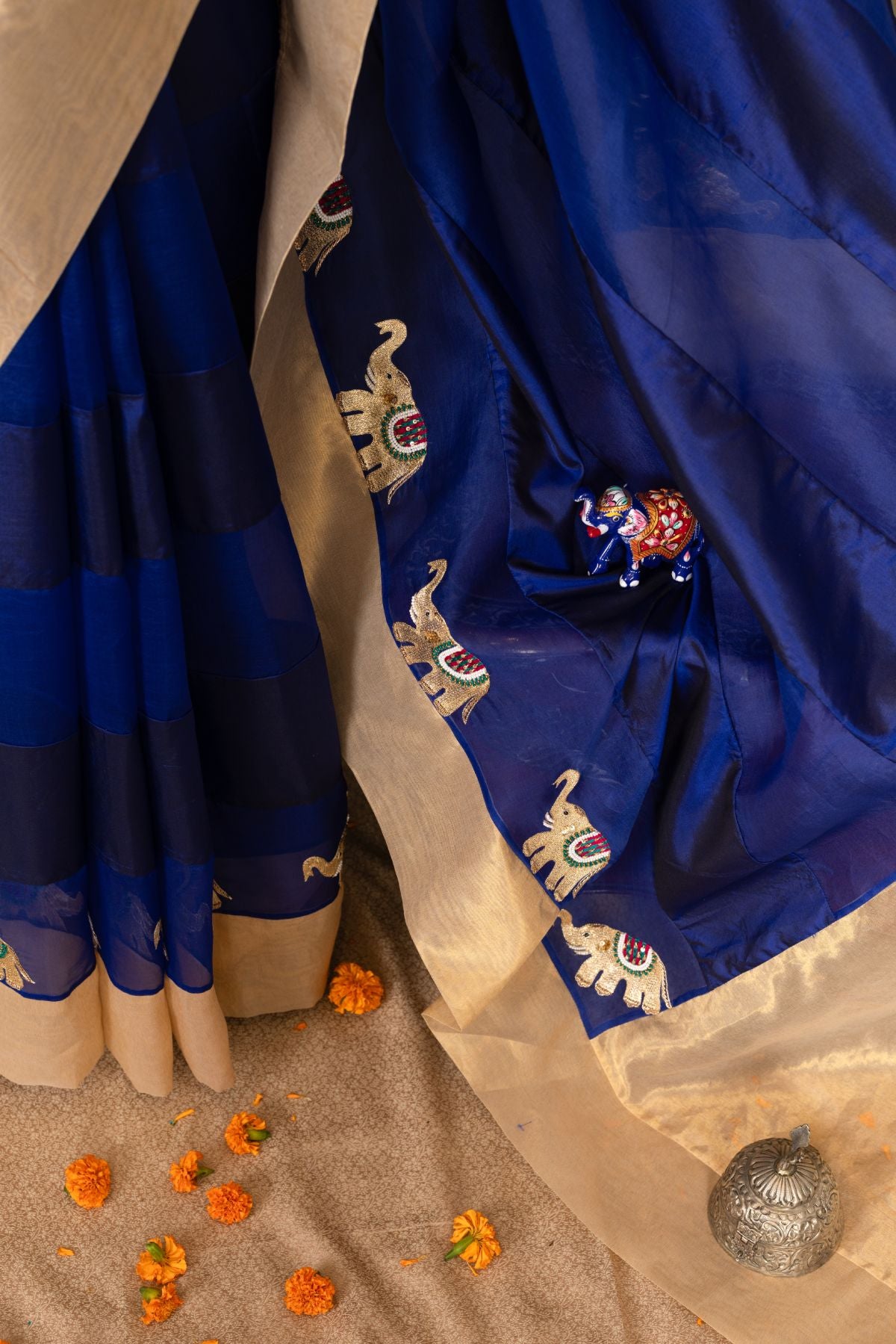 The Royal Azure - Blue Organza & Silk Saree with Hand-Embroidered Elephants and Golden Palla