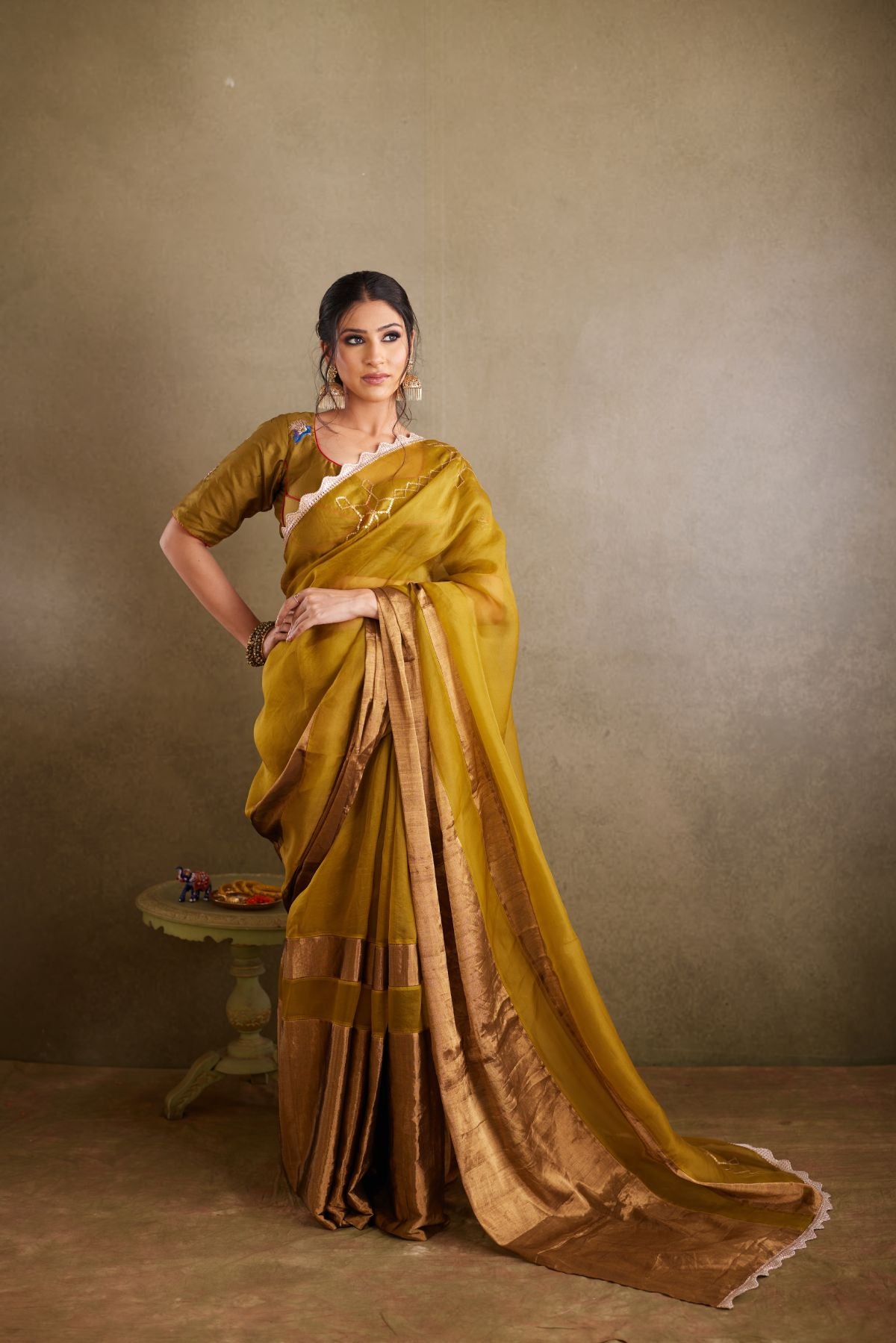 The Olive Majesty - Organza & Tissue Saree with Sequined Borders and Peacock Embroidery