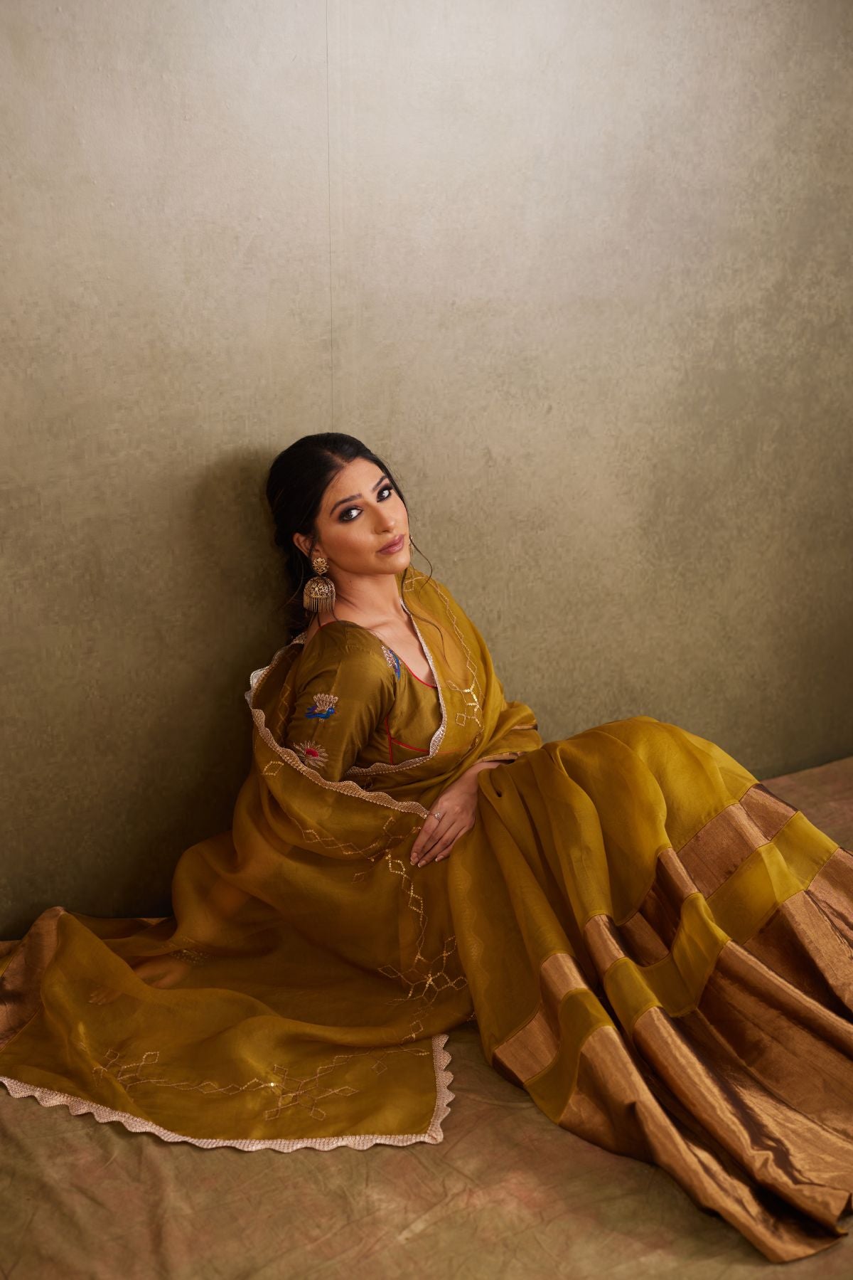 The Olive Majesty - Organza & Tissue Saree with Sequined Borders and Peacock Embroidery